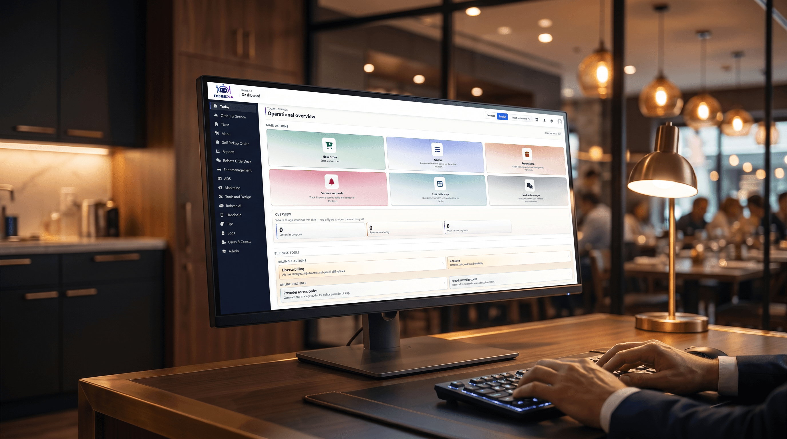 Admin dashboard on a monitor in a restaurant back office
